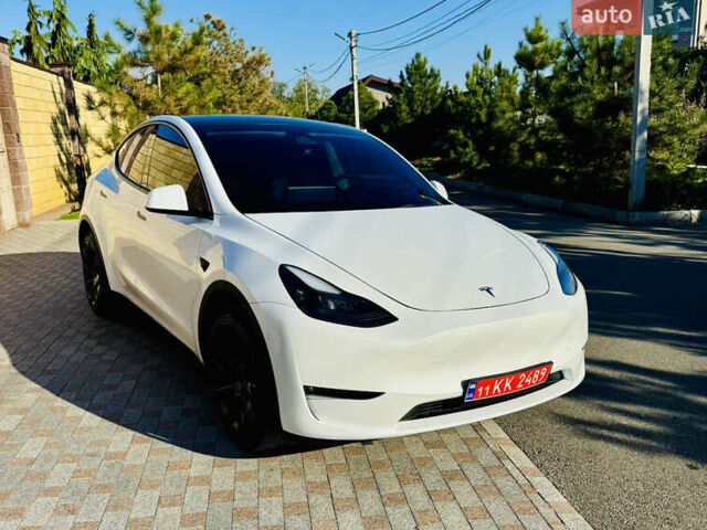 Белый Тесла Model Y, объемом двигателя 0 л и пробегом 57 тыс. км за 26500 $, фото 1 на Automoto.ua