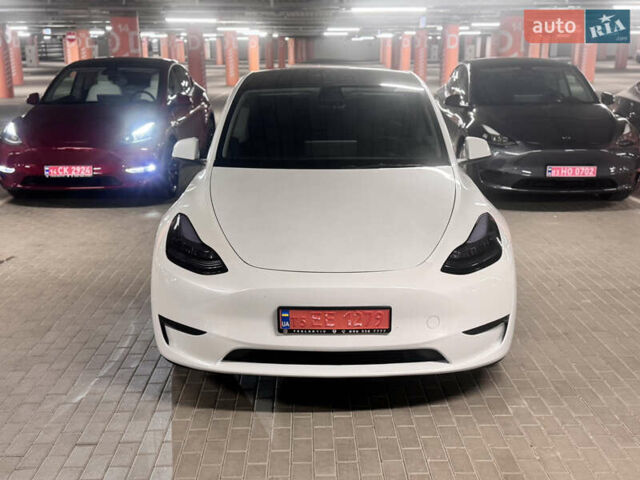 Белый Тесла Model Y, объемом двигателя 0 л и пробегом 87 тыс. км за 28999 $, фото 1 на Automoto.ua
