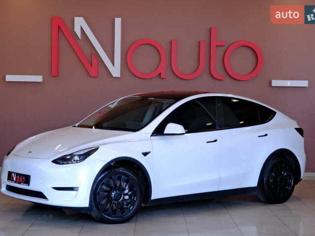 Белый Тесла Model Y, объемом двигателя 0 л и пробегом 52 тыс. км за 26900 $, фото 1 на Automoto.ua