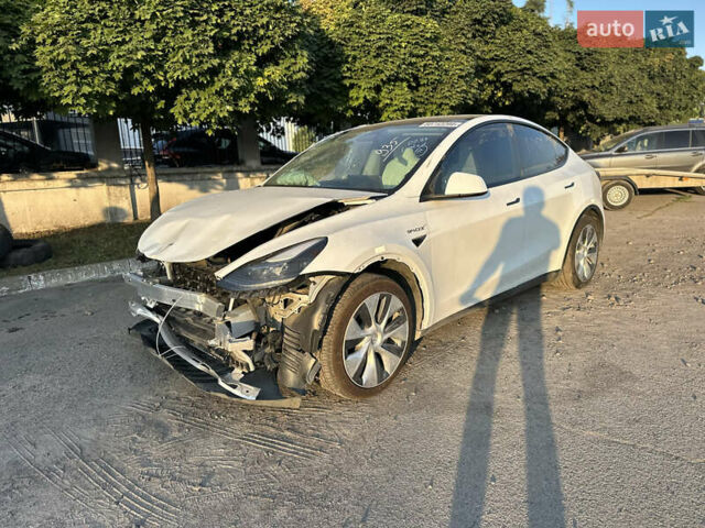 Белый Тесла Model Y, объемом двигателя 0 л и пробегом 96 тыс. км за 18290 $, фото 1 на Automoto.ua
