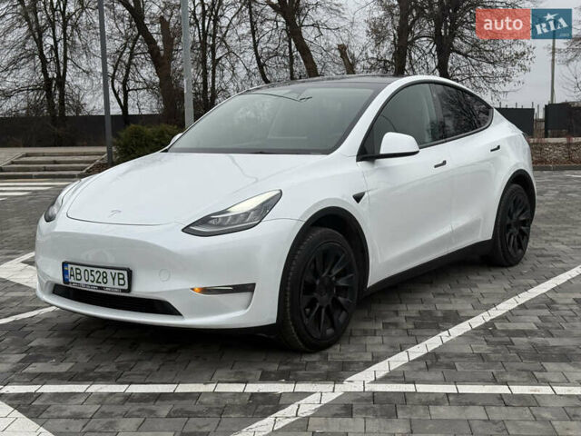 Белый Тесла Model Y, объемом двигателя 0 л и пробегом 53 тыс. км за 28800 $, фото 1 на Automoto.ua