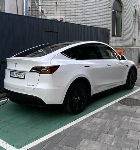 Белый Тесла Model Y, объемом двигателя 0 л и пробегом 42 тыс. км за 25000 $, фото 1 на Automoto.ua