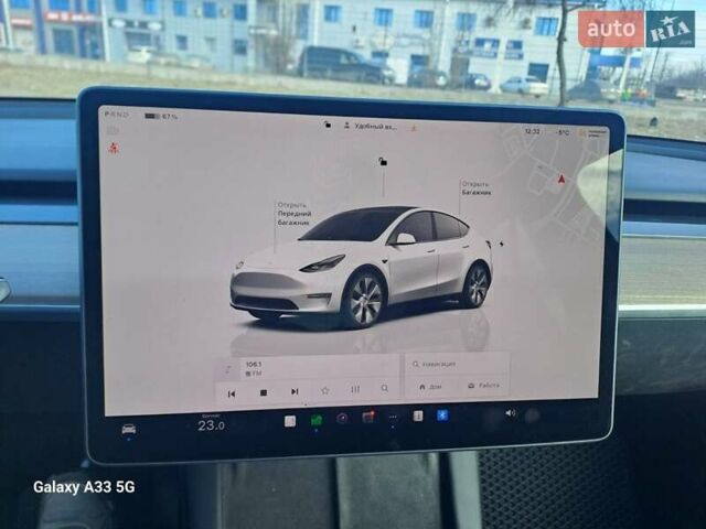 Белый Тесла Model Y, объемом двигателя 0 л и пробегом 48 тыс. км за 28500 $, фото 1 на Automoto.ua