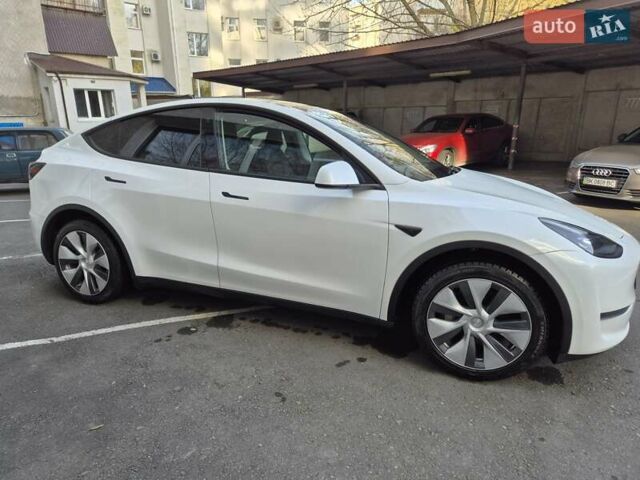 Білий Тесла Model Y, об'ємом двигуна 0 л та пробігом 67 тис. км за 25500 $, фото 1 на Automoto.ua