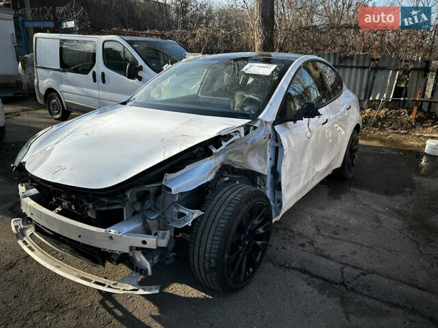 Белый Тесла Model Y, объемом двигателя 1.87 л и пробегом 64 тыс. км за 15500 $, фото 1 на Automoto.ua