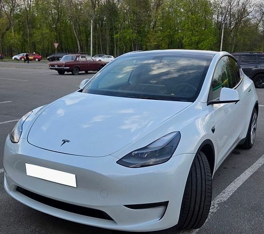 Белый Тесла Model Y, объемом двигателя 0 л и пробегом 55 тыс. км за 26900 $, фото 1 на Automoto.ua
