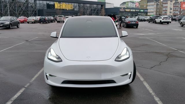 Белый Тесла Model Y, объемом двигателя 0 л и пробегом 50 тыс. км за 26500 $, фото 1 на Automoto.ua