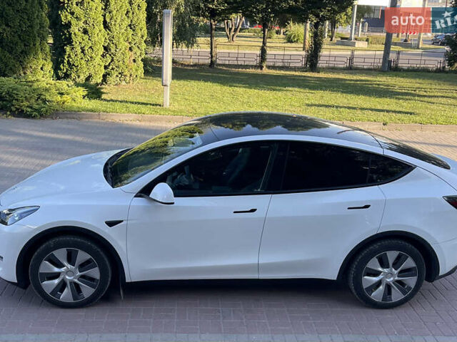 Белый Тесла Model Y, объемом двигателя 0 л и пробегом 81 тыс. км за 24700 $, фото 1 на Automoto.ua