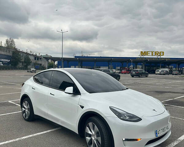Белый Тесла Model Y, объемом двигателя 0 л и пробегом 35 тыс. км за 29000 $, фото 1 на Automoto.ua