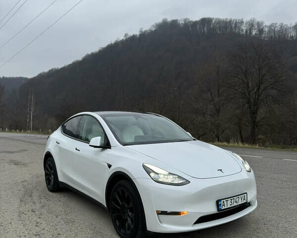 Белый Тесла Model Y, объемом двигателя 0 л и пробегом 23 тыс. км за 34000 $, фото 1 на Automoto.ua