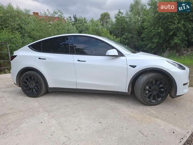Білий Тесла Model Y, об'ємом двигуна 0 л та пробігом 39 тис. км за 25600 $, фото 1 на Automoto.ua