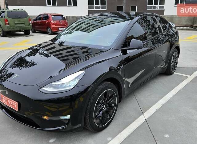 Черный Тесла Model Y, объемом двигателя 0 л и пробегом 136 тыс. км за 23990 $, фото 1 на Automoto.ua