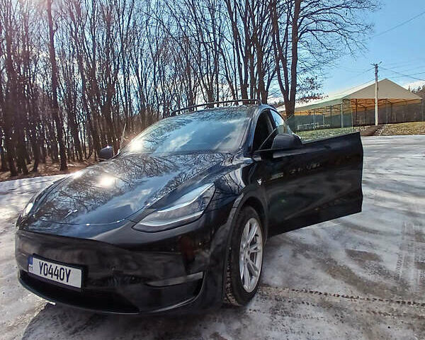 Черный Тесла Model Y, объемом двигателя 0 л и пробегом 100 тыс. км за 19500 $, фото 1 на Automoto.ua