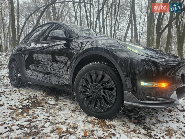 Черный Тесла Model Y, объемом двигателя 0 л и пробегом 90 тыс. км за 22900 $, фото 1 на Automoto.ua