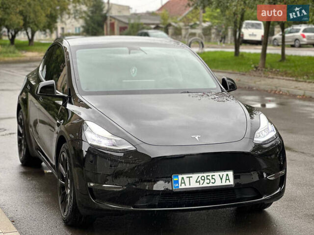 Черный Тесла Model Y, объемом двигателя 0 л и пробегом 82 тыс. км за 26000 $, фото 1 на Automoto.ua
