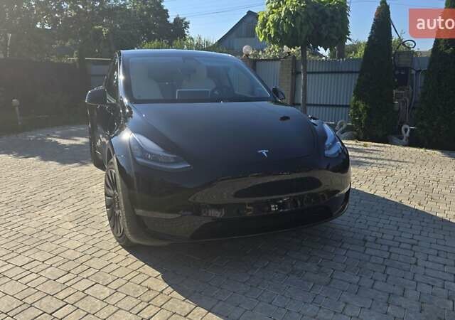 Черный Тесла Model Y, объемом двигателя 0 л и пробегом 98 тыс. км за 24700 $, фото 1 на Automoto.ua