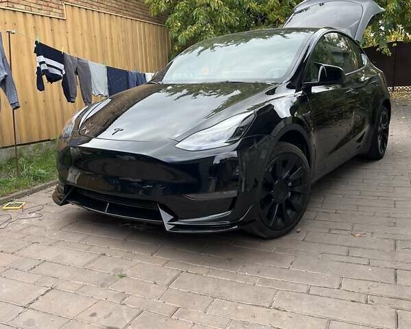 Черный Тесла Model Y, объемом двигателя 0 л и пробегом 85 тыс. км за 23500 $, фото 1 на Automoto.ua