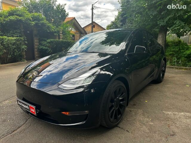 Черный Тесла Model Y, объемом двигателя 0 л и пробегом 136 тыс. км за 23990 $, фото 1 на Automoto.ua