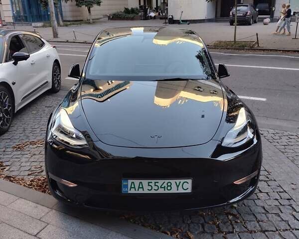 Черный Тесла Model Y, объемом двигателя 0 л и пробегом 97 тыс. км за 28000 $, фото 1 на Automoto.ua