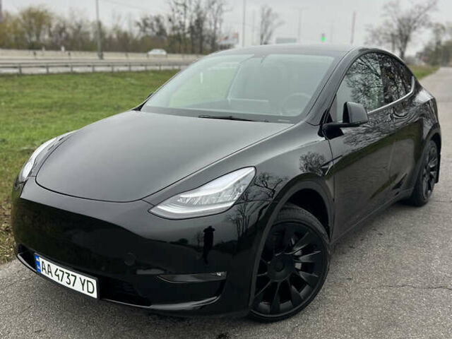 Черный Тесла Model Y, объемом двигателя 0 л и пробегом 97 тыс. км за 19999 $, фото 1 на Automoto.ua