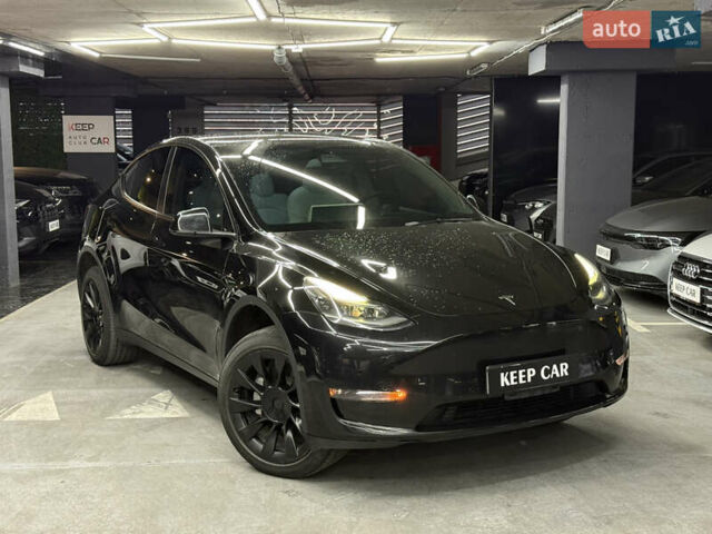 Черный Тесла Model Y, объемом двигателя 0 л и пробегом 124 тыс. км за 24900 $, фото 1 на Automoto.ua
