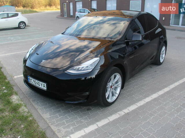 Черный Тесла Model Y, объемом двигателя 0 л и пробегом 56 тыс. км за 27499 $, фото 1 на Automoto.ua