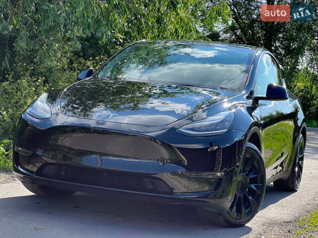 Черный Тесла Model Y, объемом двигателя 0 л и пробегом 75 тыс. км за 30900 $, фото 1 на Automoto.ua