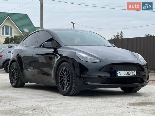 Чорний Тесла Model Y, об'ємом двигуна 0 л та пробігом 73 тис. км за 27999 $, фото 1 на Automoto.ua