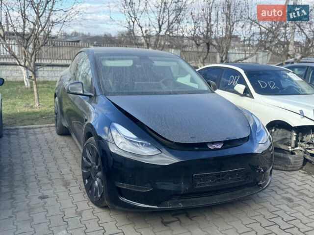 Черный Тесла Model Y, объемом двигателя 0 л и пробегом 50 тыс. км за 20000 $, фото 1 на Automoto.ua