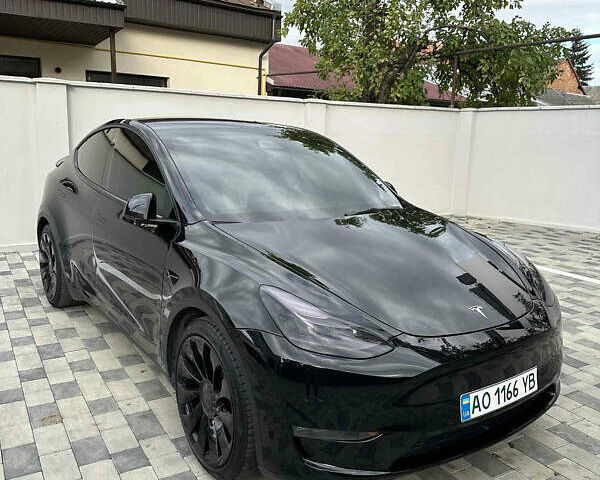 Черный Тесла Model Y, объемом двигателя 0 л и пробегом 70 тыс. км за 25999 $, фото 1 на Automoto.ua