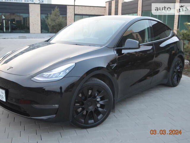 Черный Тесла Model Y, объемом двигателя 0 л и пробегом 34 тыс. км за 27900 $, фото 1 на Automoto.ua