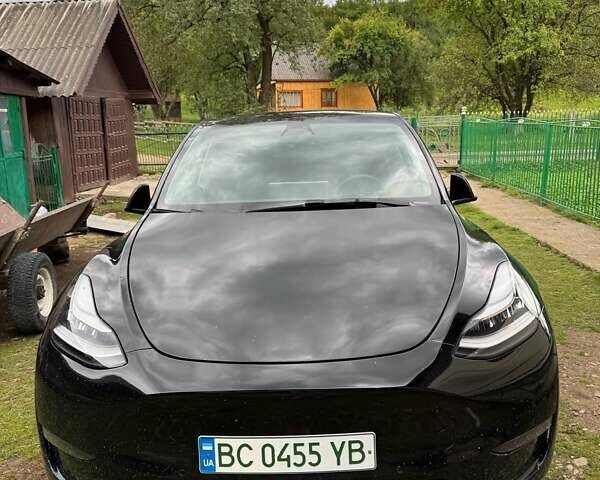 Черный Тесла Model Y, объемом двигателя 0 л и пробегом 78 тыс. км за 27500 $, фото 1 на Automoto.ua