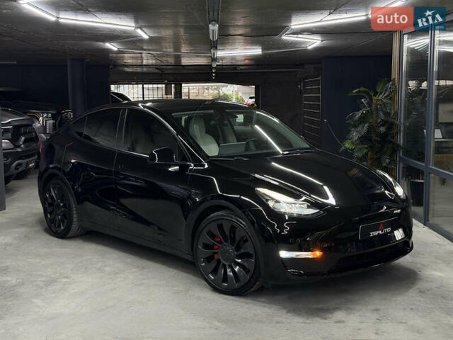 Черный Тесла Model Y, объемом двигателя 0 л и пробегом 70 тыс. км за 26900 $, фото 1 на Automoto.ua