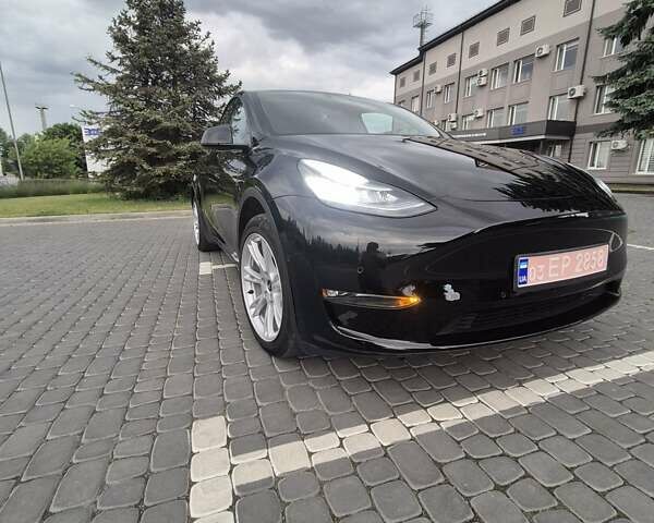Черный Тесла Model Y, объемом двигателя 0 л и пробегом 104 тыс. км за 23700 $, фото 1 на Automoto.ua
