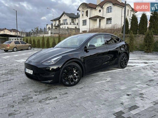 Черный Тесла Model Y, объемом двигателя 0 л и пробегом 79 тыс. км за 34000 $, фото 1 на Automoto.ua