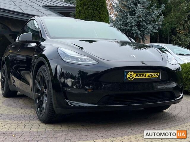 Черный Тесла Model Y, объемом двигателя 75 л и пробегом 68 тыс. км за 30700 $, фото 1 на Automoto.ua