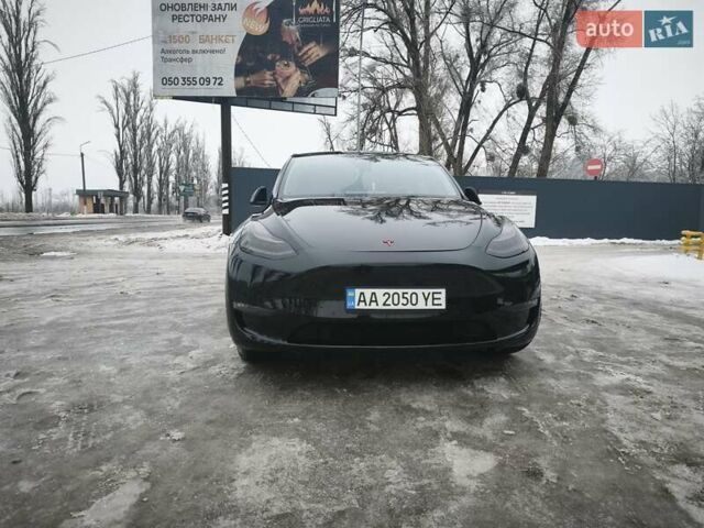 Черный Тесла Model Y, объемом двигателя 0 л и пробегом 63 тыс. км за 24900 $, фото 1 на Automoto.ua