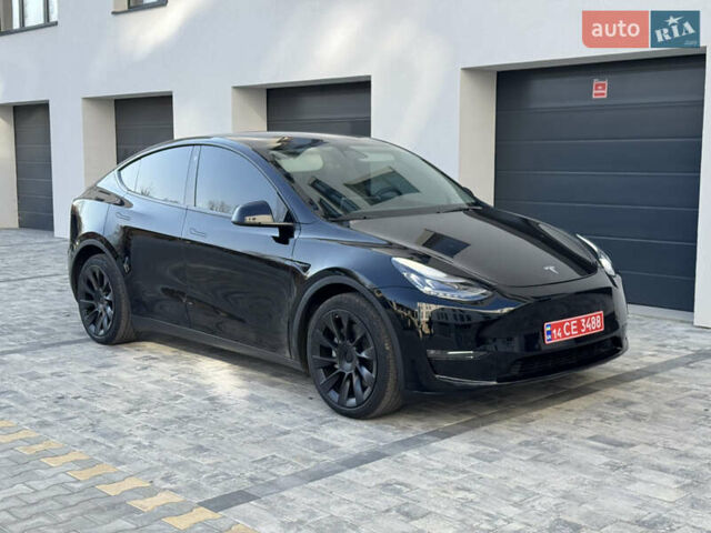 Черный Тесла Model Y, объемом двигателя 0 л и пробегом 48 тыс. км за 28999 $, фото 1 на Automoto.ua