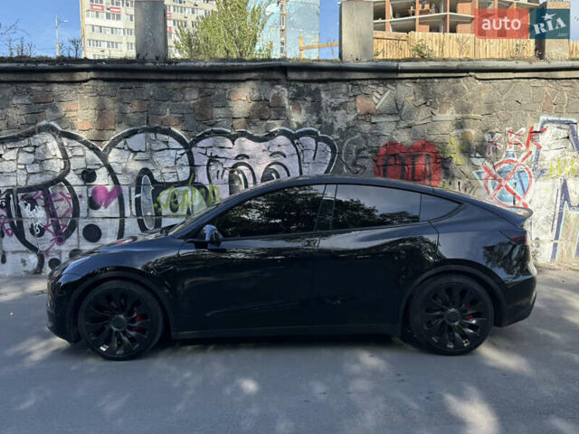 Черный Тесла Model Y, объемом двигателя 0 л и пробегом 56 тыс. км за 35000 $, фото 1 на Automoto.ua