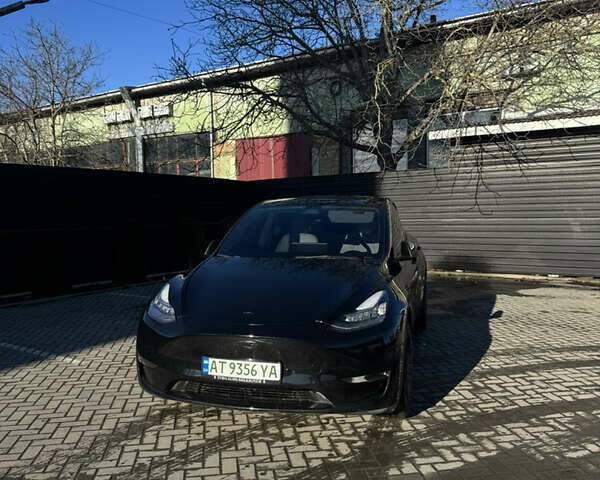 Черный Тесла Model Y, объемом двигателя 0 л и пробегом 51 тыс. км за 23200 $, фото 1 на Automoto.ua