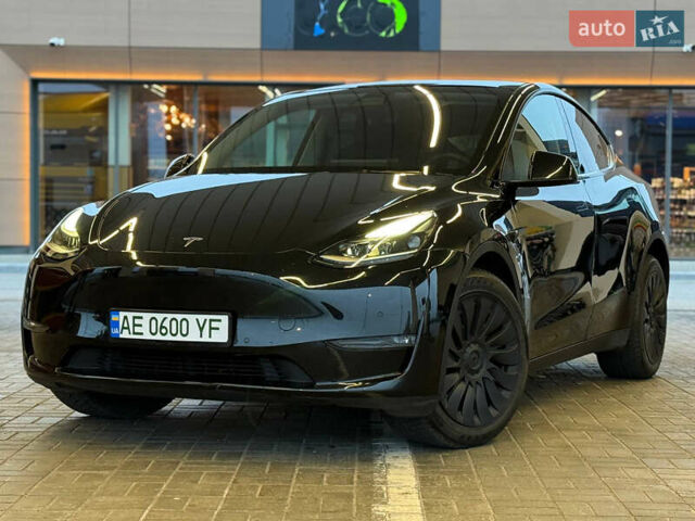 Черный Тесла Model Y, объемом двигателя 0 л и пробегом 53 тыс. км за 34999 $, фото 1 на Automoto.ua