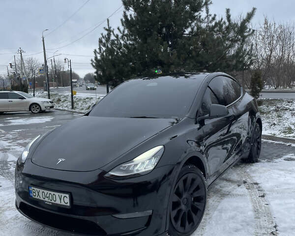 Черный Тесла Model Y, объемом двигателя 0 л и пробегом 56 тыс. км за 26999 $, фото 1 на Automoto.ua
