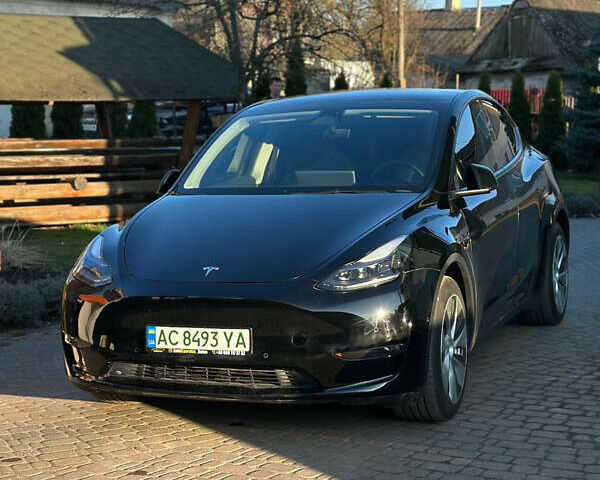 Черный Тесла Model Y, объемом двигателя 0 л и пробегом 24 тыс. км за 27999 $, фото 1 на Automoto.ua