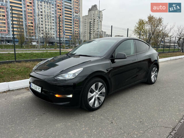 Черный Тесла Model Y, объемом двигателя 0 л и пробегом 61 тыс. км за 22900 $, фото 1 на Automoto.ua