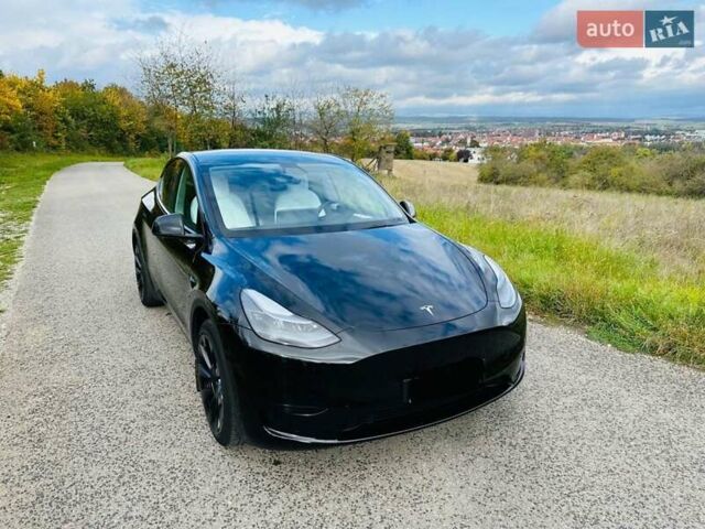 Черный Тесла Model Y, объемом двигателя 0 л и пробегом 10 тыс. км за 28999 $, фото 1 на Automoto.ua