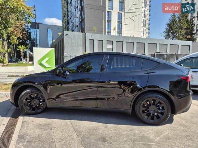 Черный Тесла Model Y, объемом двигателя 0 л и пробегом 14 тыс. км за 31500 $, фото 1 на Automoto.ua