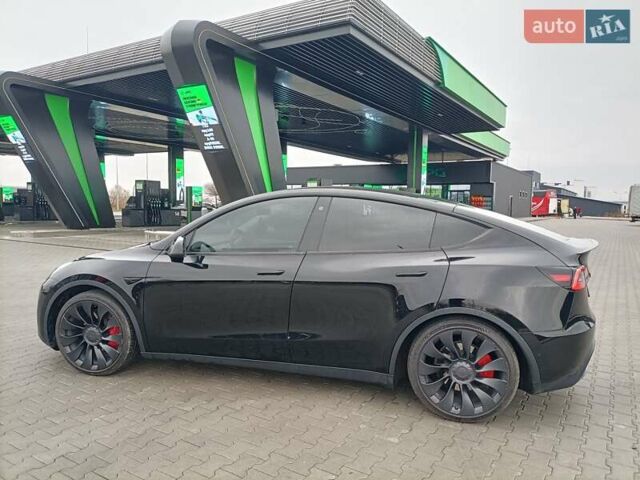 Черный Тесла Model Y, объемом двигателя 0 л и пробегом 52 тыс. км за 26300 $, фото 1 на Automoto.ua