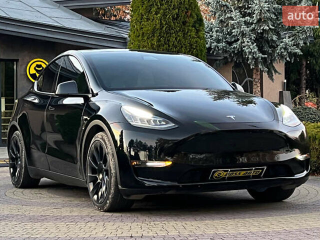 Черный Тесла Model Y, объемом двигателя 0 л и пробегом 121 тыс. км за 25750 $, фото 1 на Automoto.ua
