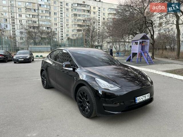 Черный Тесла Model Y, объемом двигателя 0 л и пробегом 66 тыс. км за 29000 $, фото 1 на Automoto.ua