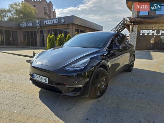 Черный Тесла Model Y, объемом двигателя 0 л и пробегом 27 тыс. км за 28999 $, фото 1 на Automoto.ua